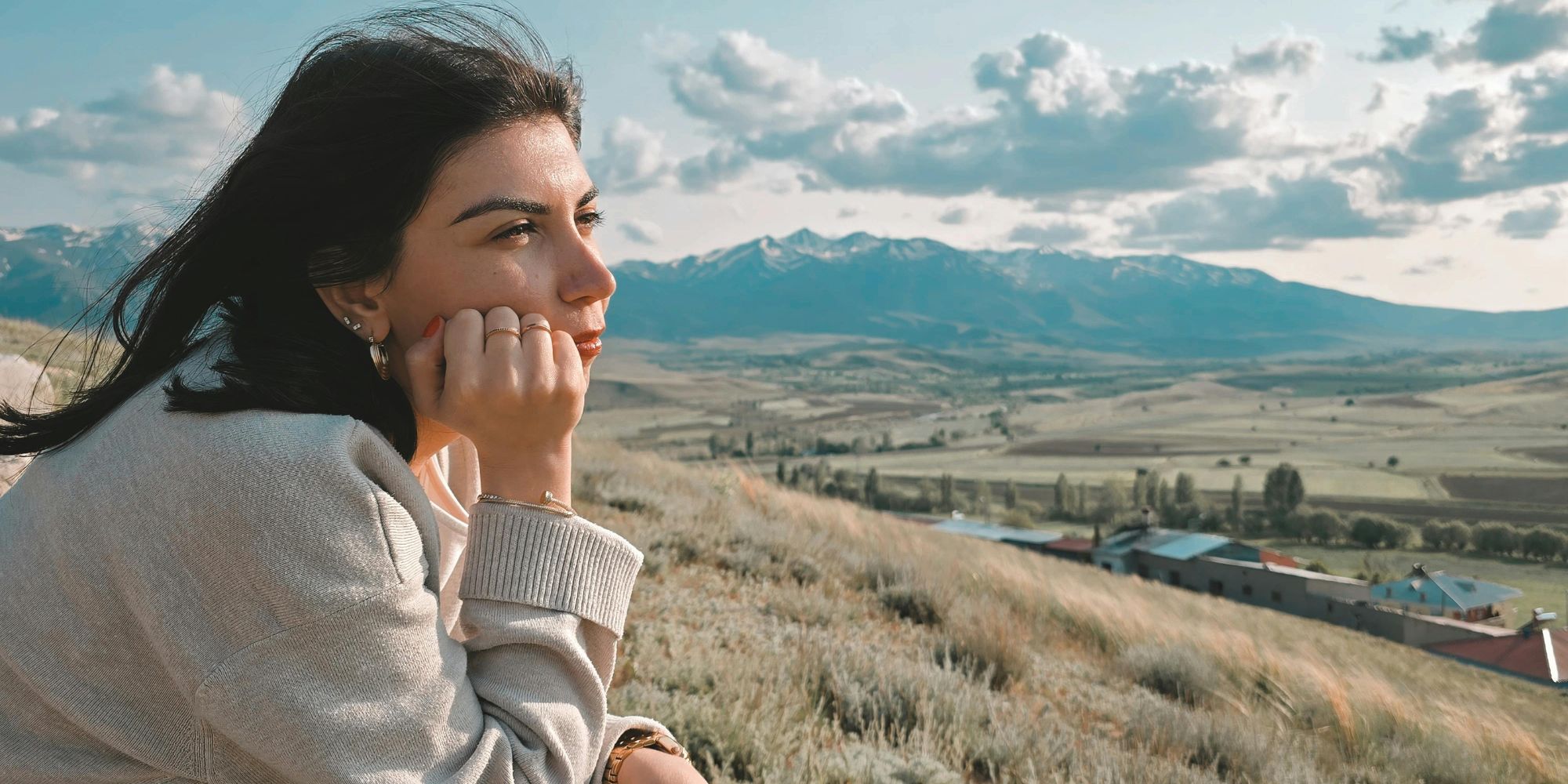 woman outside looking out